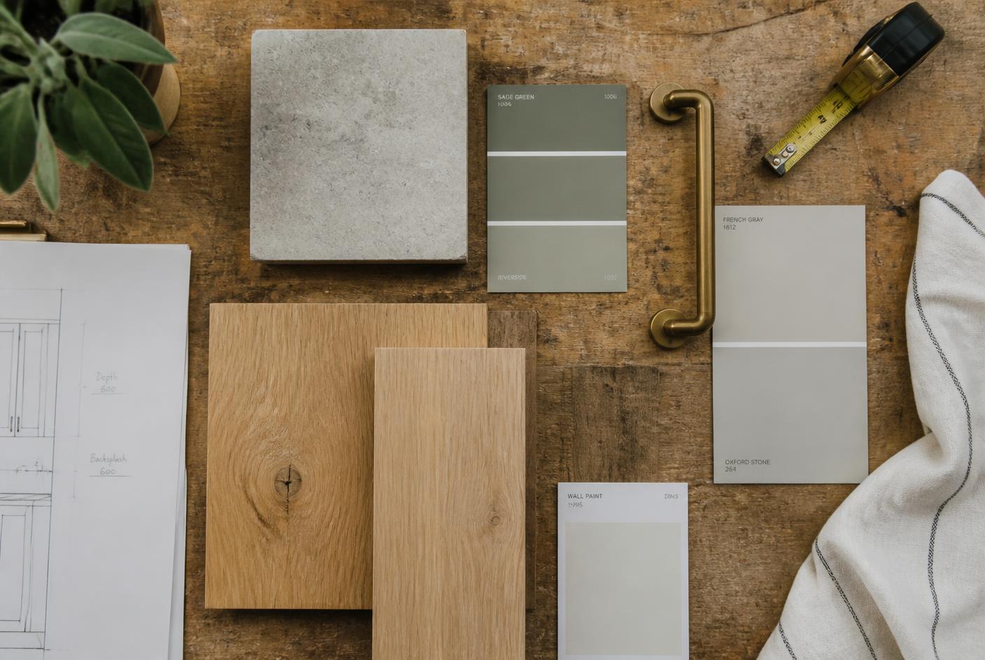 Oak, stone and paint samples laid out during material selection for a renovation